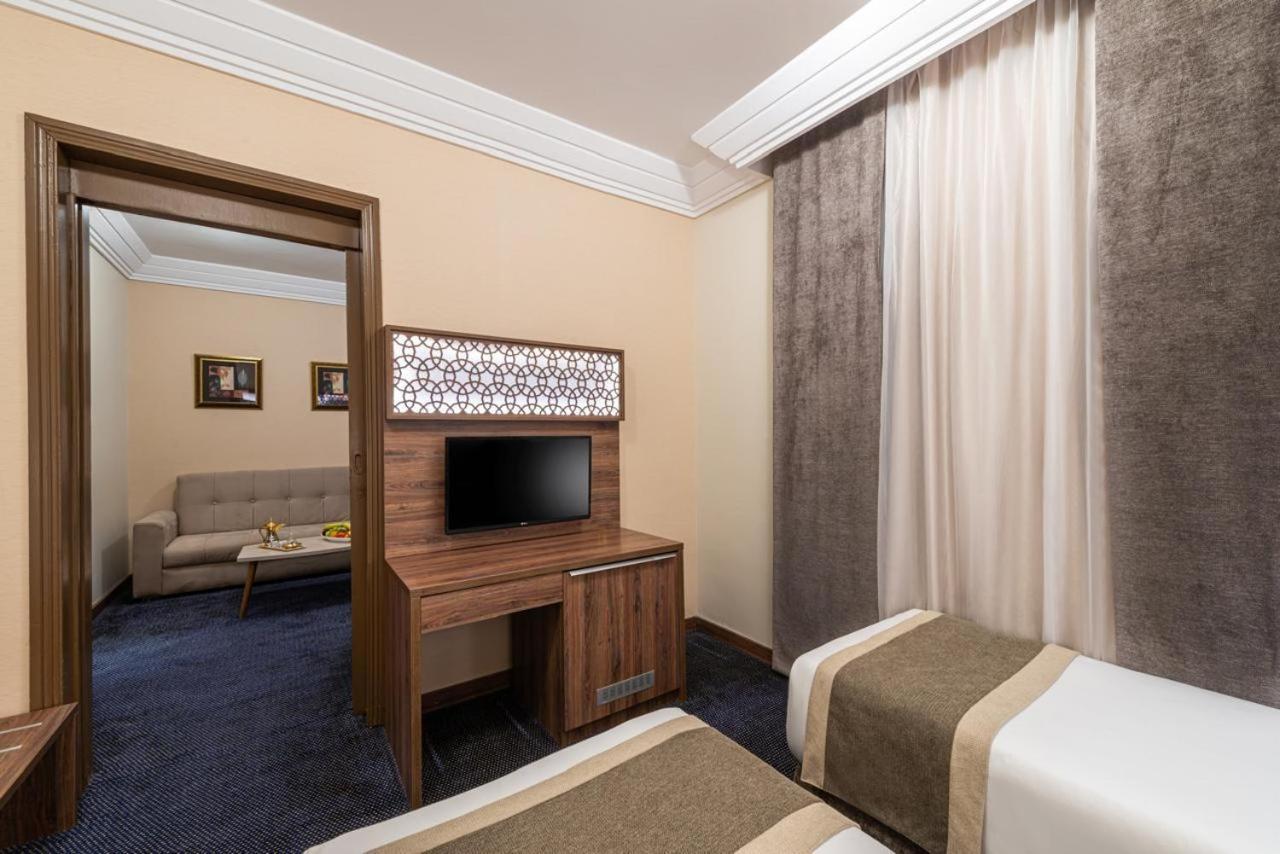 Golden Tulip Al-Zahabi Hotel Medina Quarto foto